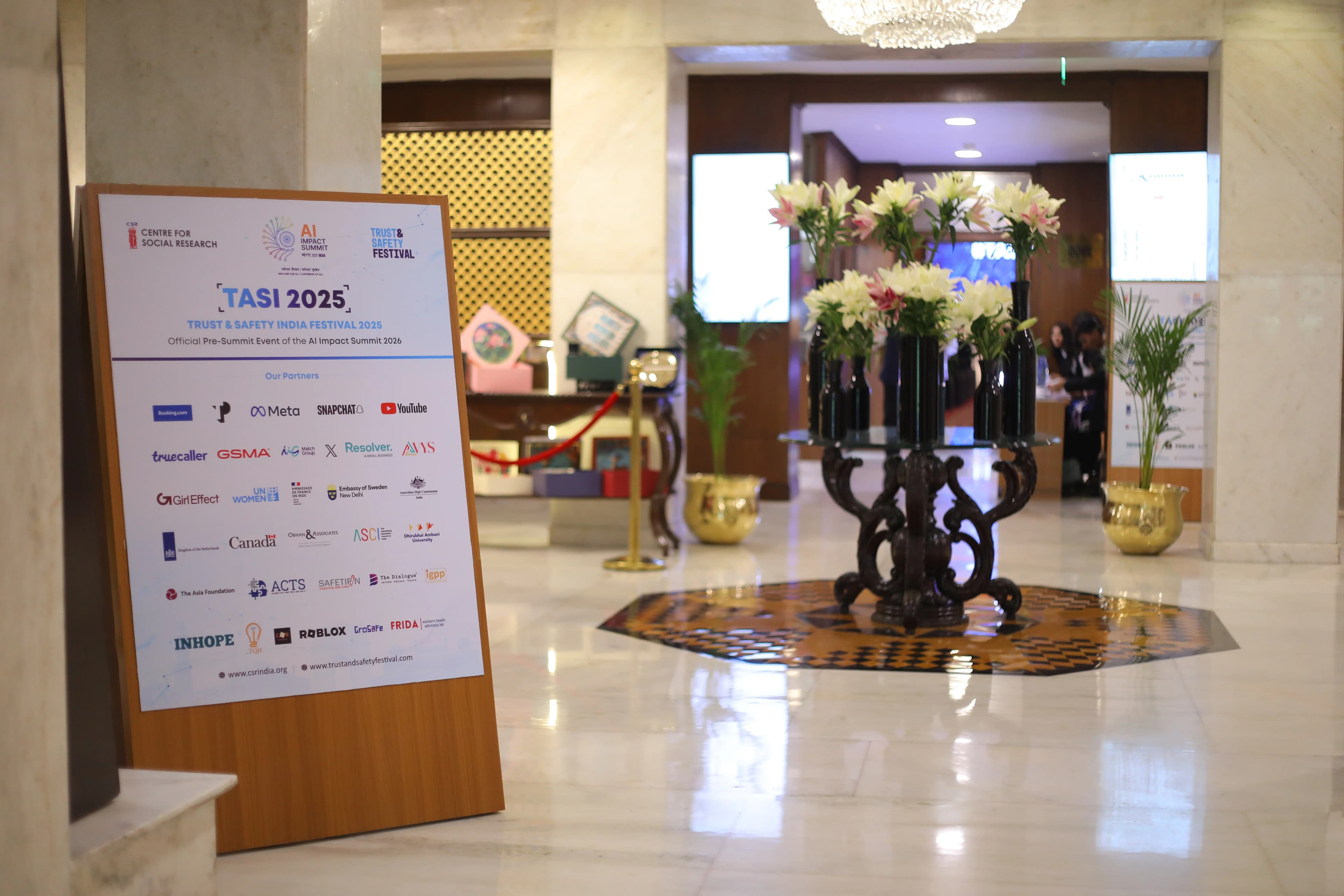 TASI 2025 partner recognition welcome board in the entrance lobby