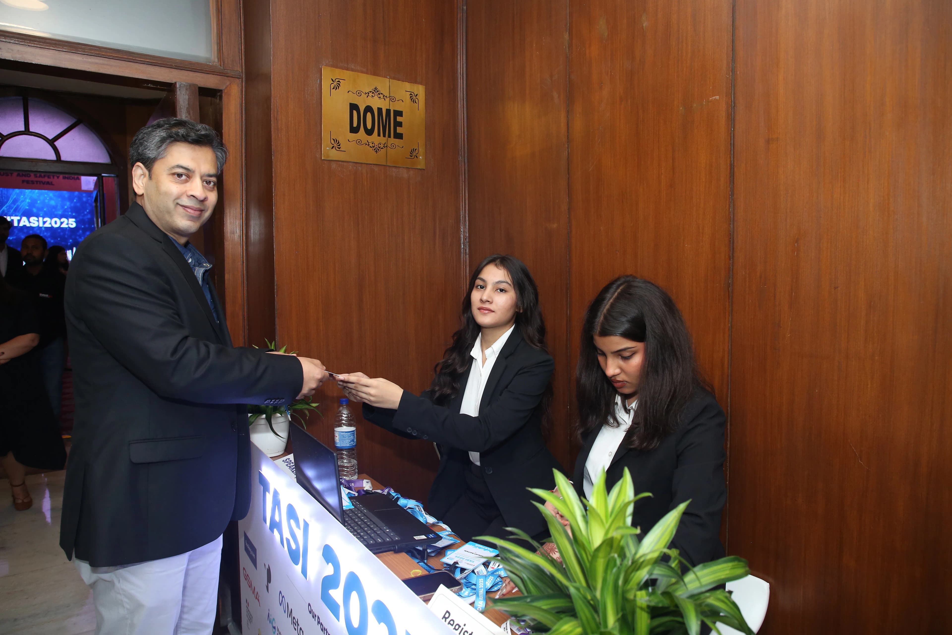 Volunteer team handling attendee arrivals at TASI